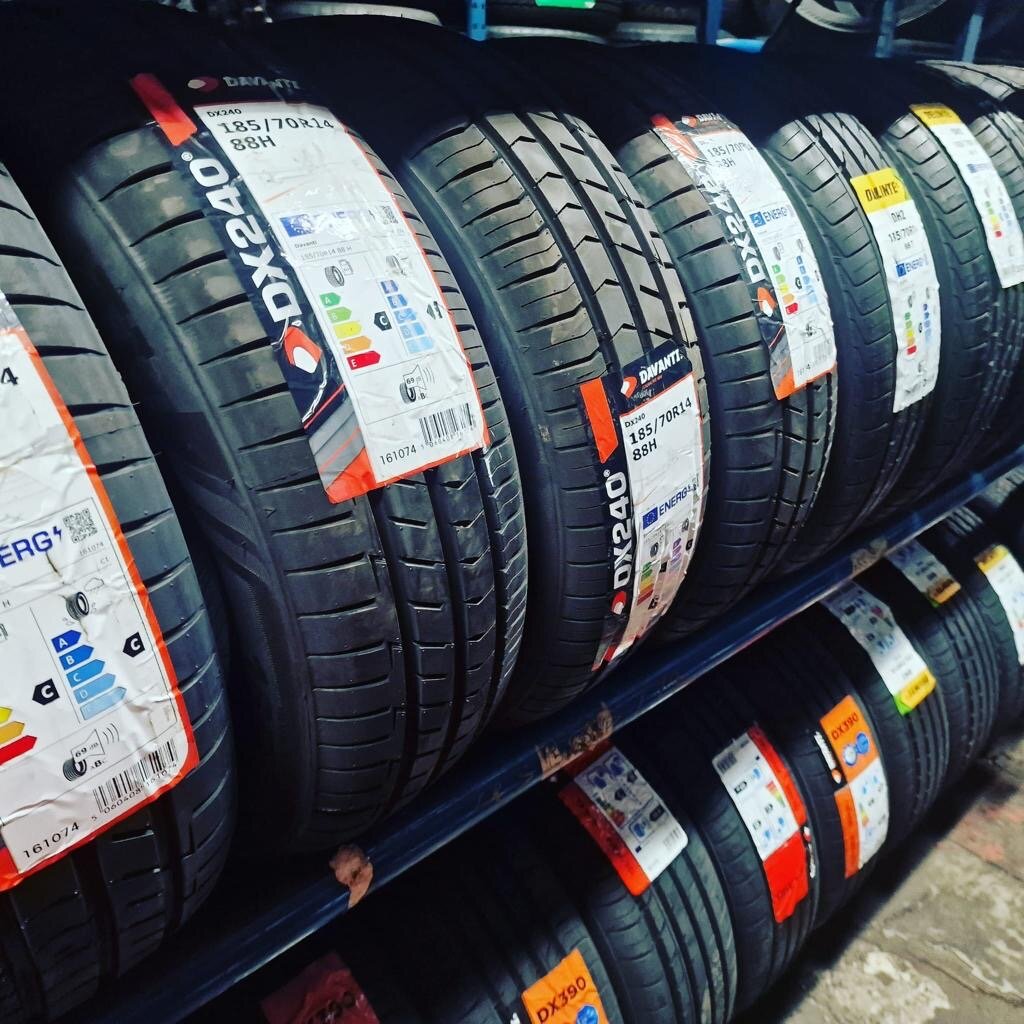 Wide view of a fully stocked tyre rack ready for callouts